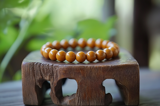 The Timeless Beauty and Healing Power of Golden Nanmu Bracelets and Rosaries